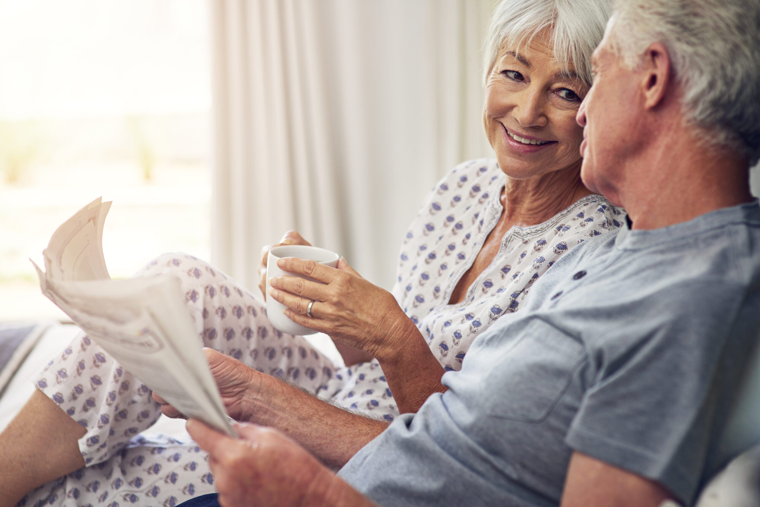 Couple enjoying coffee and morning at Kahler Inn and Suites